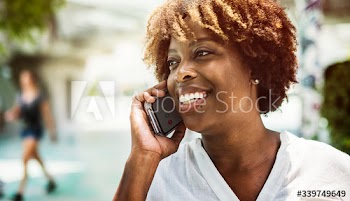 Happy woman talking on the phone