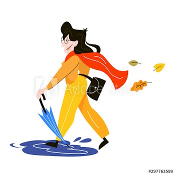 Happy woman with blue umbrella walking on puddles