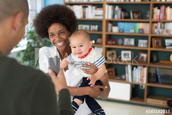 Happy young family with baby