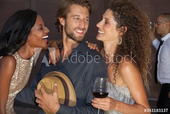 Happy young friends enjoying party