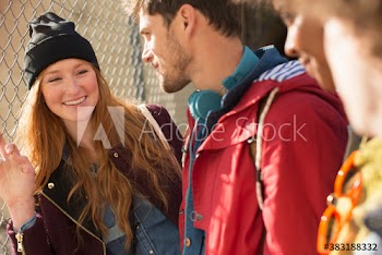 Happy young friends talking