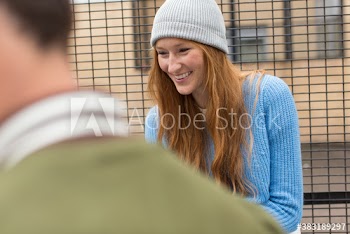 Happy young woman laughing