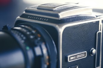 Hasselblad camera just sitting there on the porch. Love that.