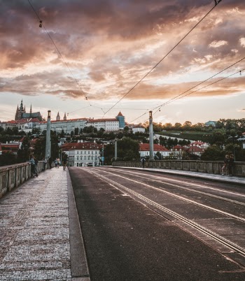 Hdr Photo of Person Walking Across the Bridge