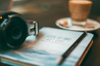 Headphones On A Book