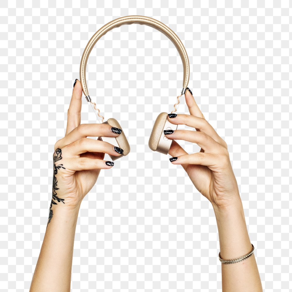 Headphones png in hand sticker | Free PNG - rawpixel