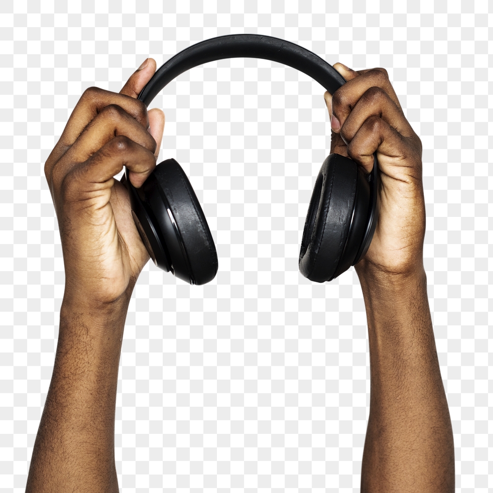 Headphones png in hand sticker | Free PNG - rawpixel