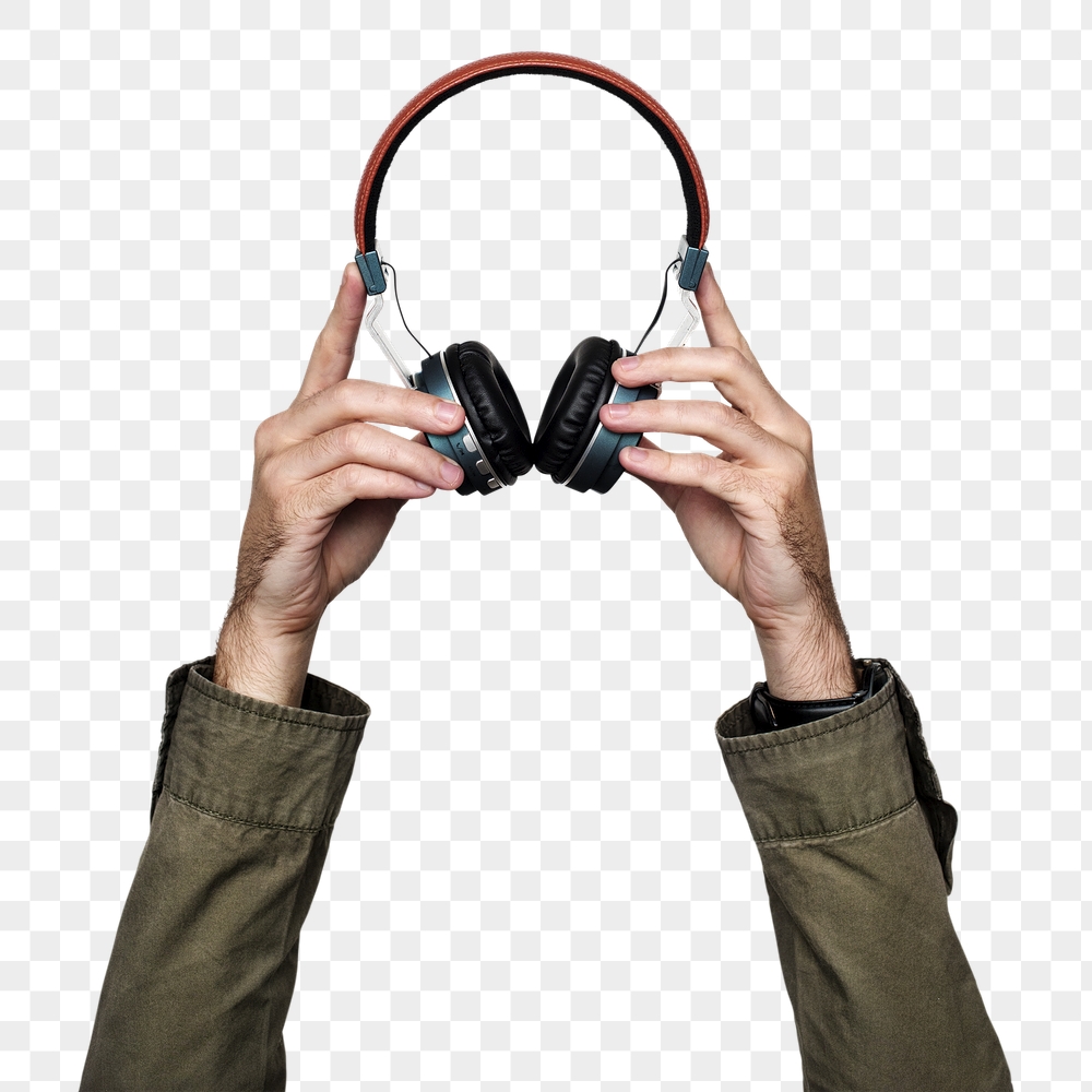 Headphones png in hand sticker | Free PNG - rawpixel