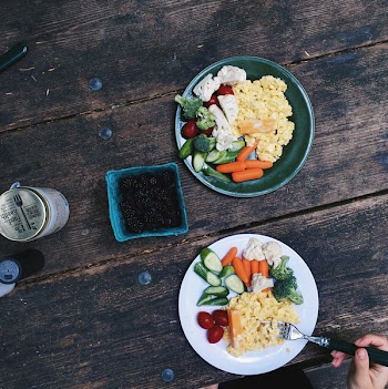 Healthy breakfast with eggs while camping 