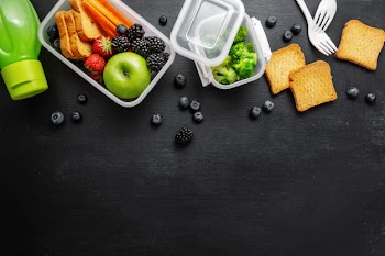 Healthy lunch to go packed in lunch box Free Photo