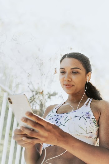 Healthy woman using phone while | Free Photo - rawpixel