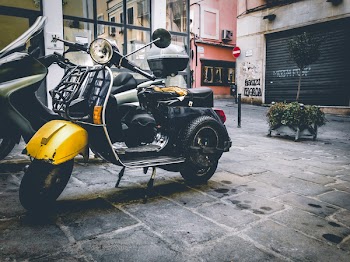 Helmet on the Footrest of Motor Scooter