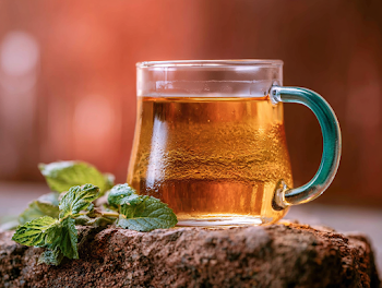 Herbal Tea in a Teal Glass Mug