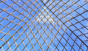 high angle photo of clear and brown glass infrastructure during daytime