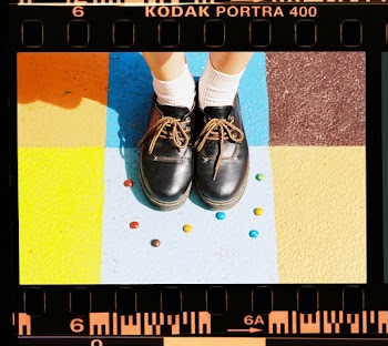 High-Angle Photo of Person Wearing Leather Shoes
