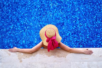 High-Angle Photo of Person Wearing Sun Hat