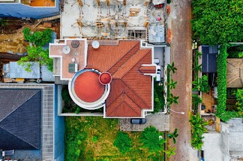 High-angle Photo of Red Roof Shingles