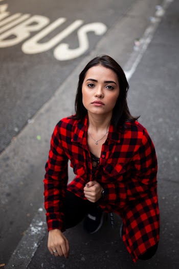 High-Angle Photo of Woman Wearing Red Plaid Shirt