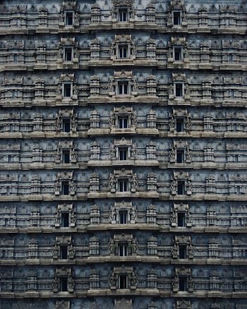 high angle photography of blue and brown concrete high rise building at daytime