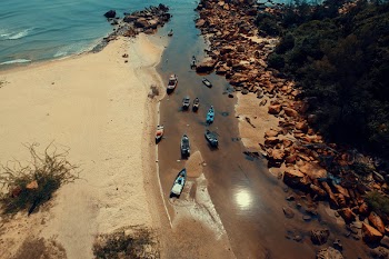 High Angle Photography of Boats on Beach