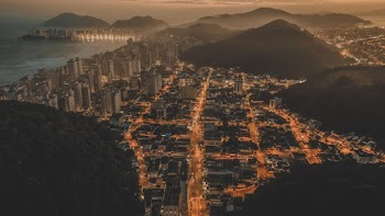High-angle Photography of Buildings Near Mountains
