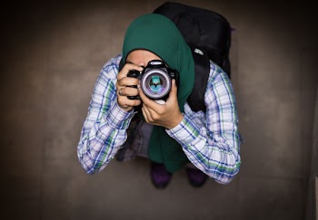 High-angle Photography of Person Holding Canon Dslr Camera