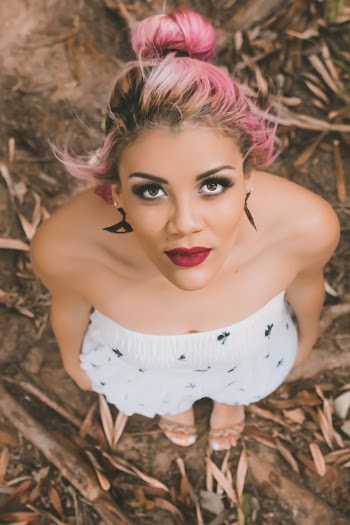 High-angle Photography of Pink-haired Woman Standing on Withered Leaves