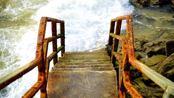 High-angle Photography of Staircase Leading to Seashore
