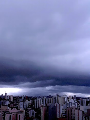 High-rise and Mid-rise Buildings Under Cloudy Sky
