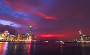High Rise Building during Nighttime Near Ocean