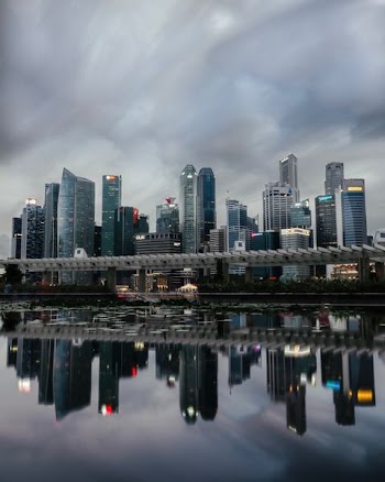 high rise buildings near body of water