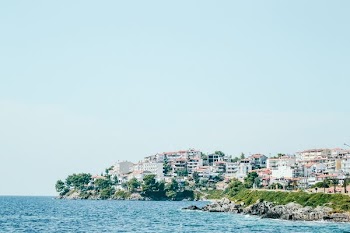 high rise buildings near cliff