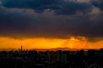 High-rise Buildings Under Clouds