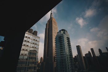 High-rise Concrete Builidngs Under Blue Sky