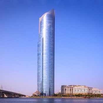 High-rise Glass Building Near Body of Water
