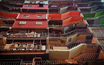 high-rise red and orange concrete building