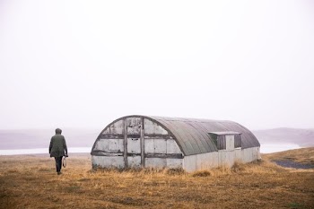 Hiking Abandoned Quonset In Field