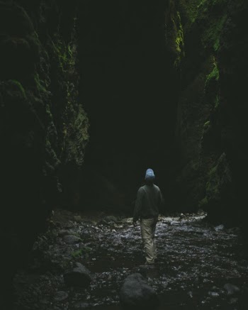 Hiking in Thórsmörk Valley in Iceland. Found this beautiful opening that leads straight to a waterfall. 