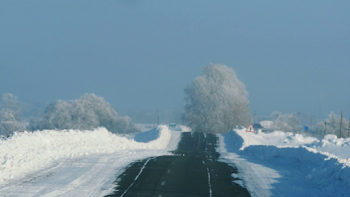Hilly road in the countryside in winter Stock Video Footage ...