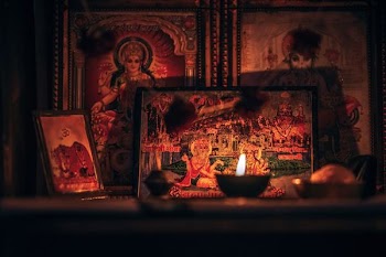 Hindu God altar with candle light