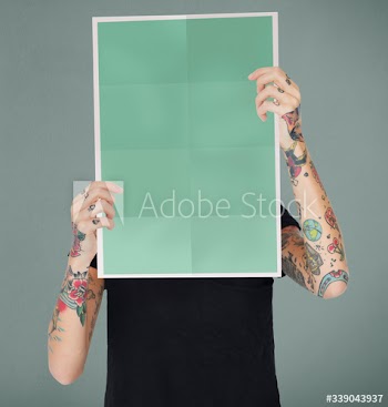 Holding a blank piece of paper
