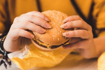 Holding Burger