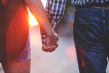 Holding Hands In With Sunrise