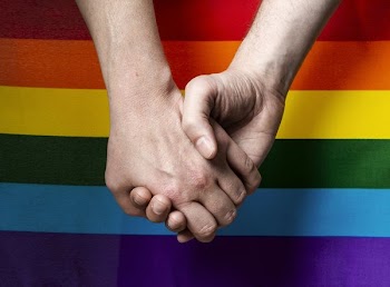 Holding Hands With Pride Flag