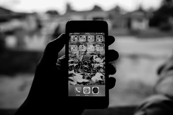          Holding Mobile Device Free Photo     