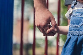 Holding Toddlers Hand