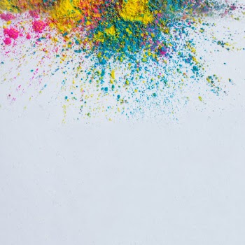 Holi color background on a white background Free Photo