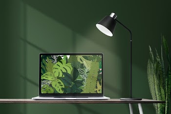 Home office interior with laptop on a table | Free stock photo | High Resolution image