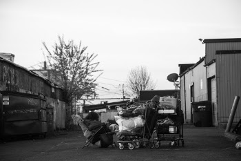 Homeless individual sleeping in Seattle Washington.