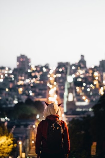 Horned Hood Watches Over City